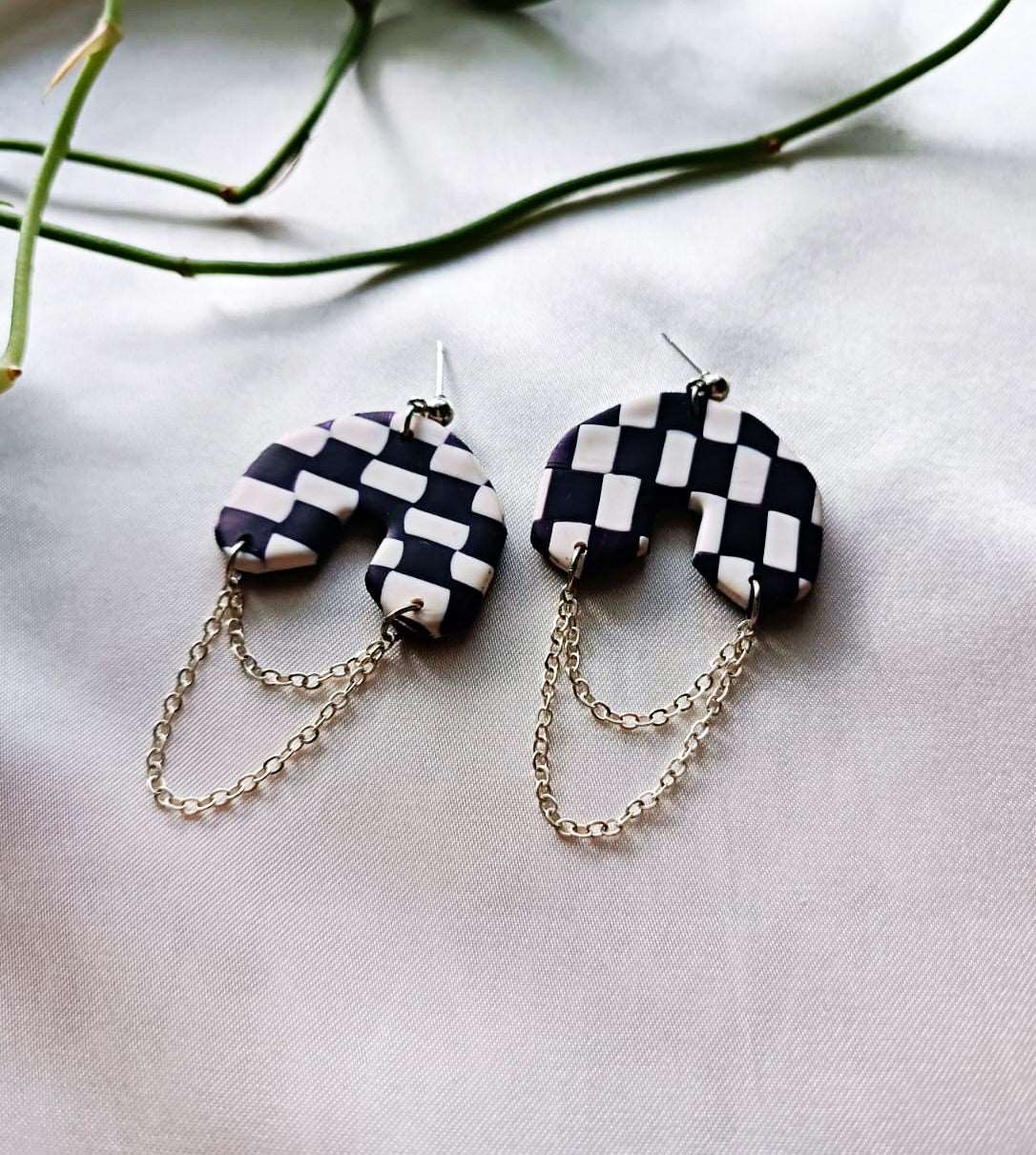 Chained black and white checkered polymer clay earrings - Delilah