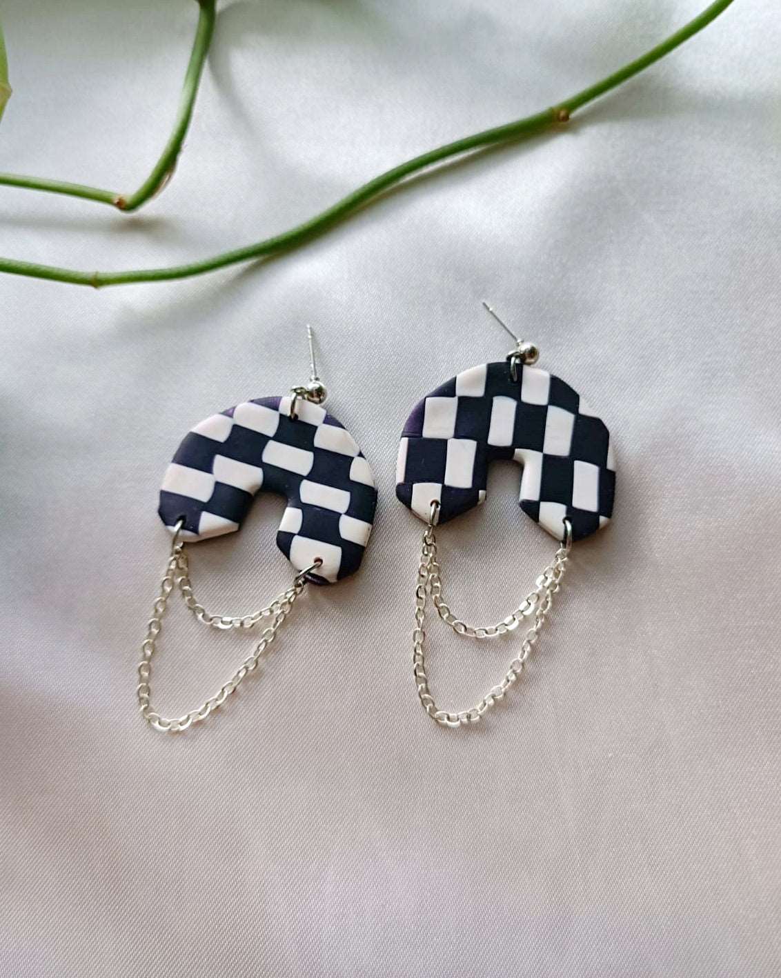 Chained black and white checkered polymer clay earrings - Delilah