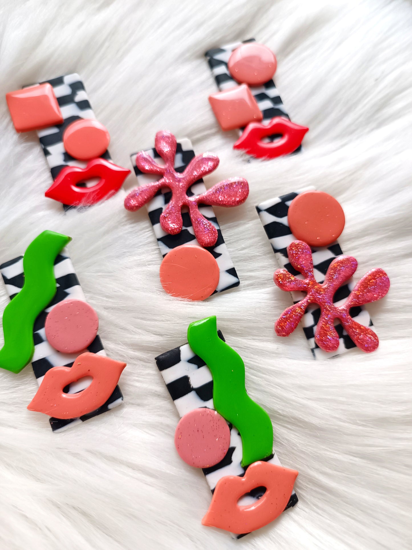 Avant-garde polymer clay earrings - abstract faces on black and white checkered background 👄 Red lips studs